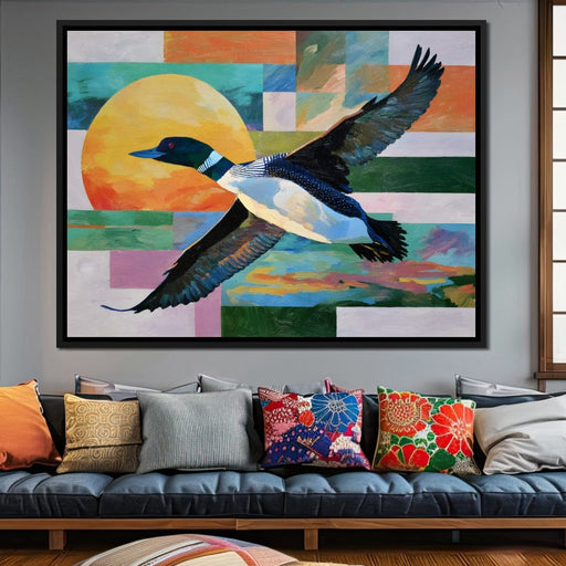 Flying Loon Over Golden Sun Canvas Print