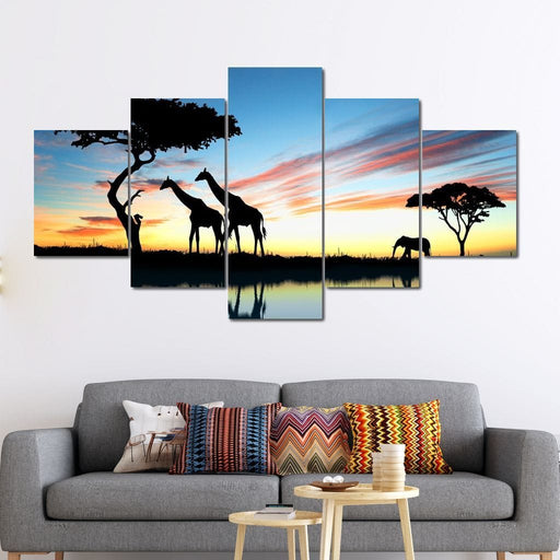 African Sunset - Canvas Print - sunset wall art of beautiful giraffes at dusk - this stunning piece of art is the perfect gift for anyone who loves to travel | NicheCanvas