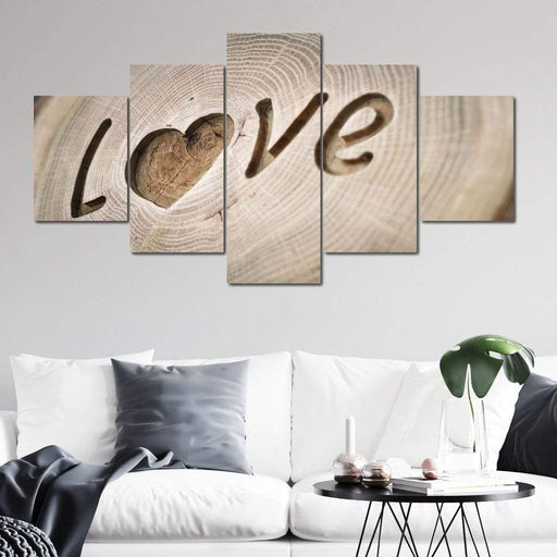 Love Tree Rings - Canvas Print - unique wall art of the word love carved on a tree trunk - this fun home decor will bring a warm environment to your living room | NicheCanvas