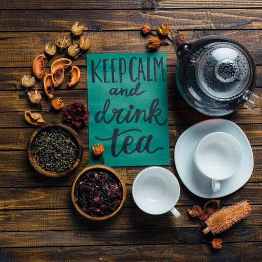Keep Calm and Drink Tea - Canvas Print - photorealistic wall art of a teapot medicinal herbs on the table - this beautiful art piece is the perfect gift for your family | NicheCanvas