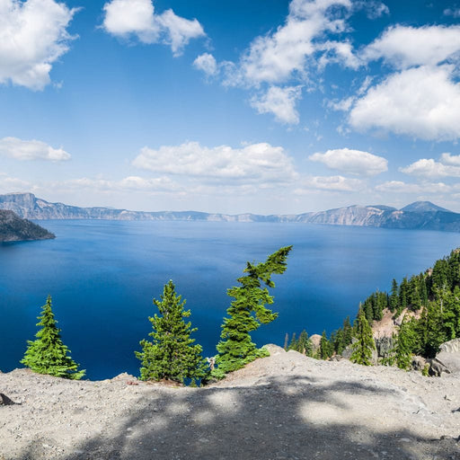 Blue Crater Lake - Lucas Moore - Canvas Print - stunning wall art with an amazing view of the mountains - this piece of art will draw eyes to your guests | NicheCanvas