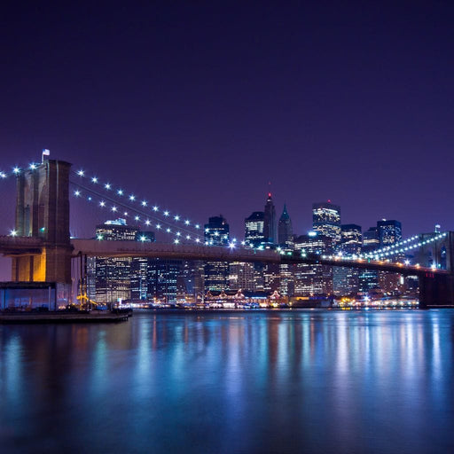 Everlasting NYC - Canvas Print - photorealistic wall decor of the Brooklyn bridge at night - the city lights makes this wall decor stand out when displayed in your home | NicheCanvas