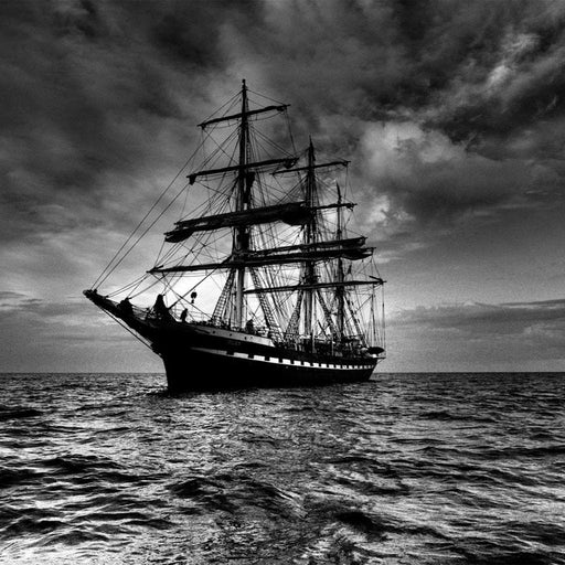Tall Sail Ship - Canvas Print - black and white canvas wall art of a ship sailing on a dark sea - this interesting art print will draw attention to your guests | NicheCanvas